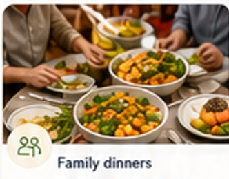 Family dinner table with shared bowls.